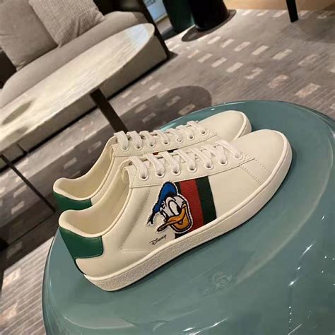 gucci x disney ace sneakers|Gucci duck flash shoes.